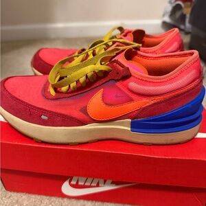 Nike Red and Pink Sneakers with Orange Swoosh